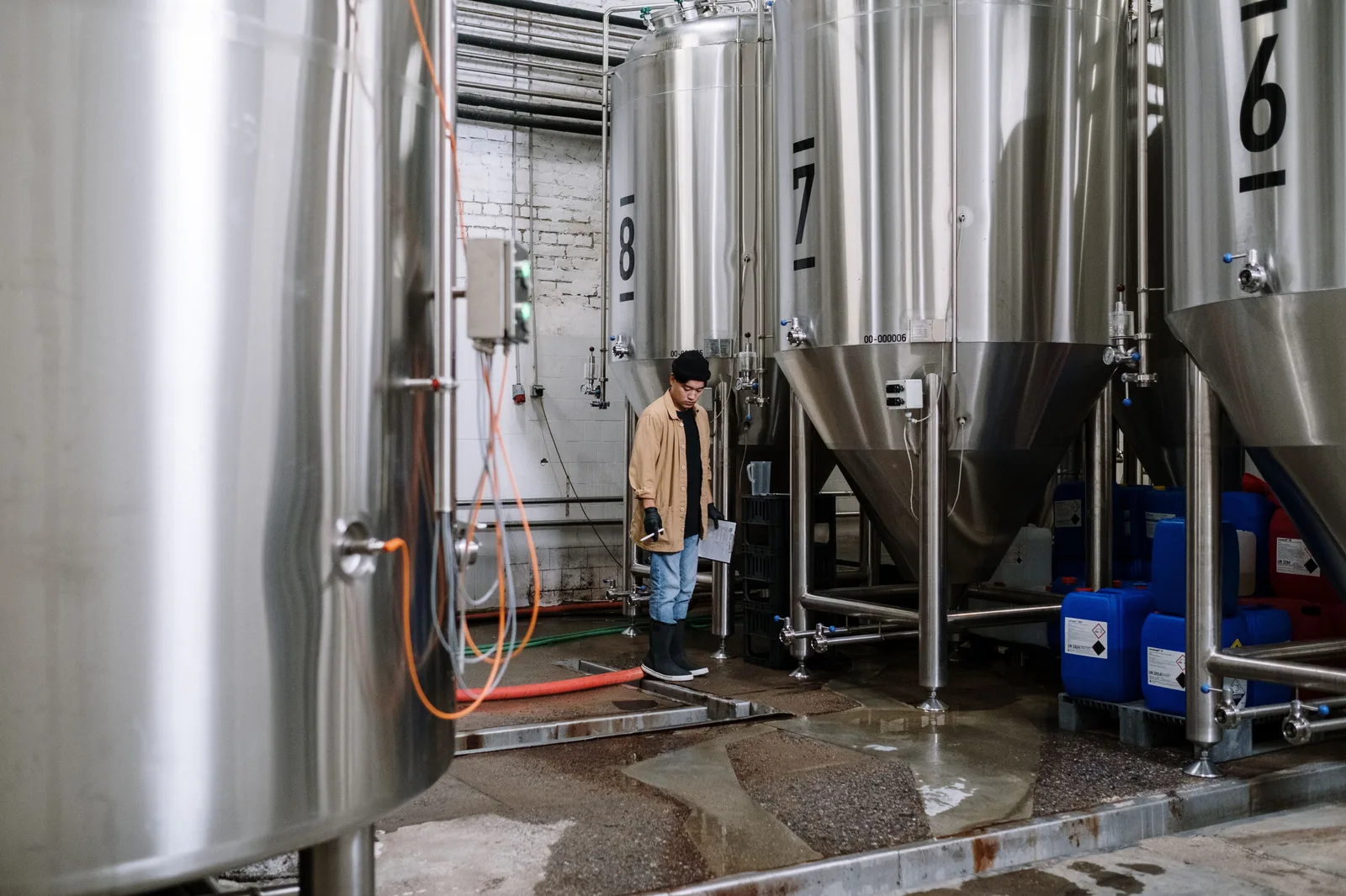 Production tanks inside a small manufacturing facility