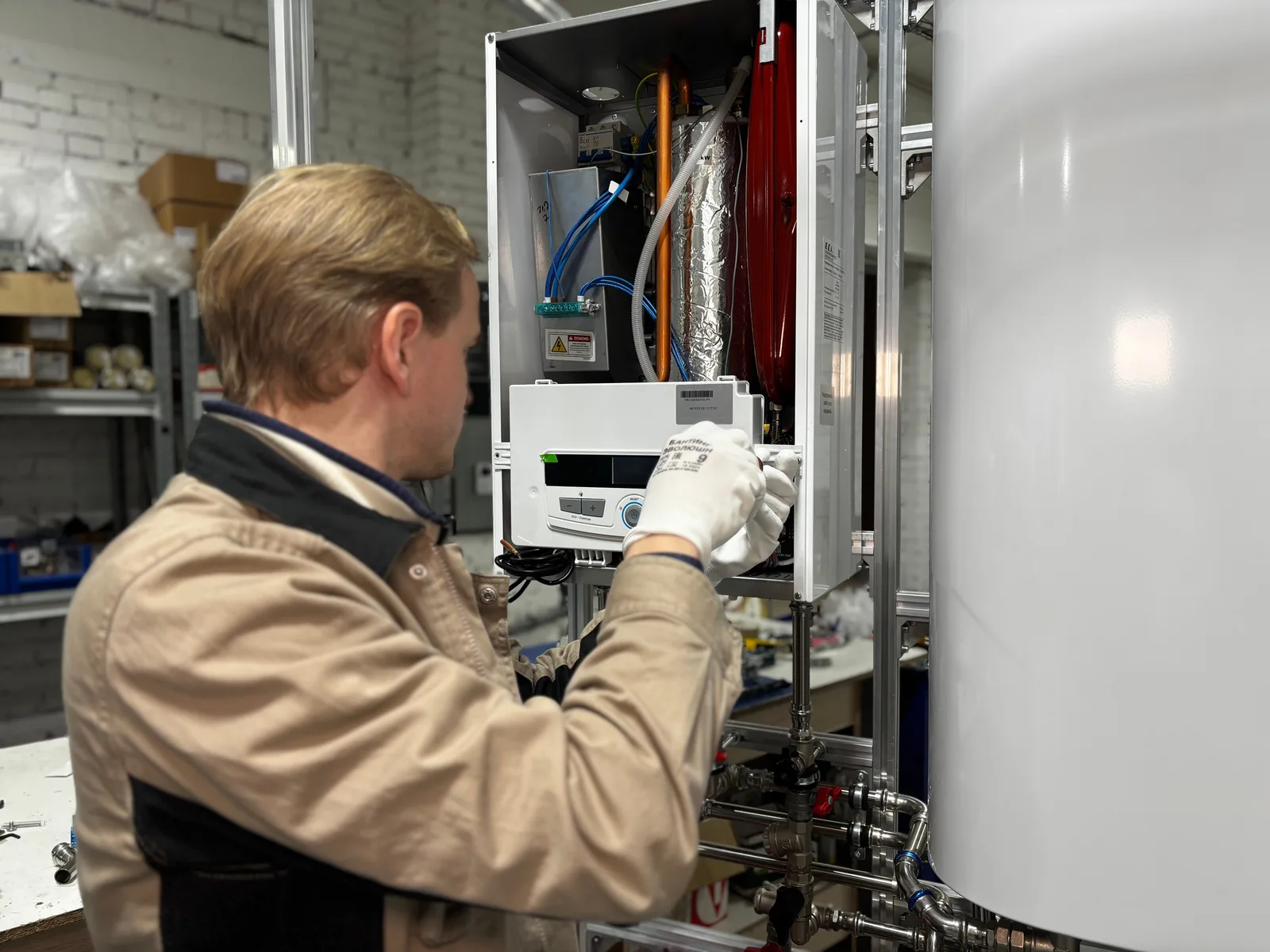 HVAC technician performing furnace service work