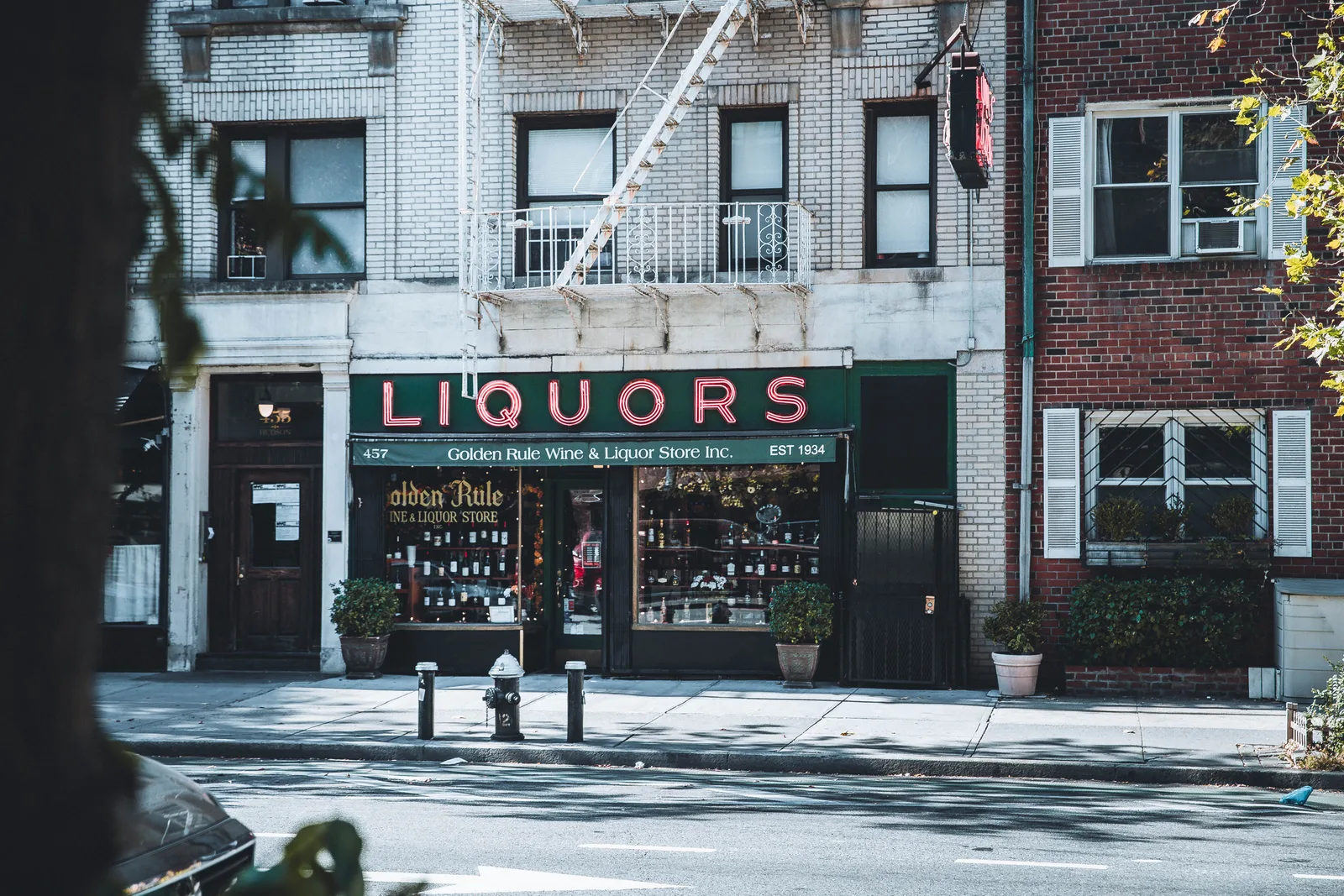 An independent liquor store front on a New York City street